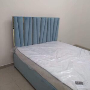 Sky Blue Velvet Tufted Bed with Gold Detailing